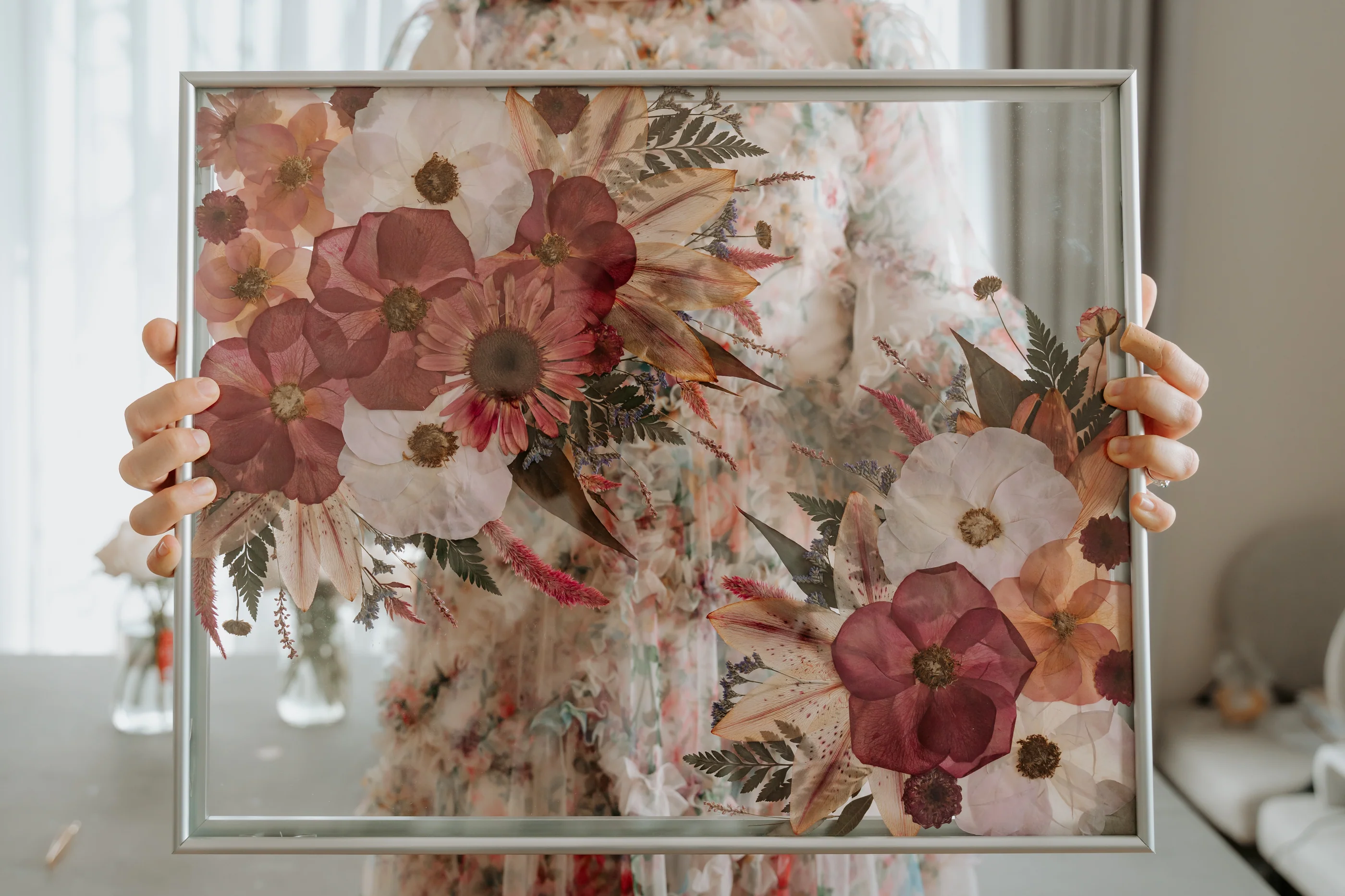 Preserved floral arrangement in glass