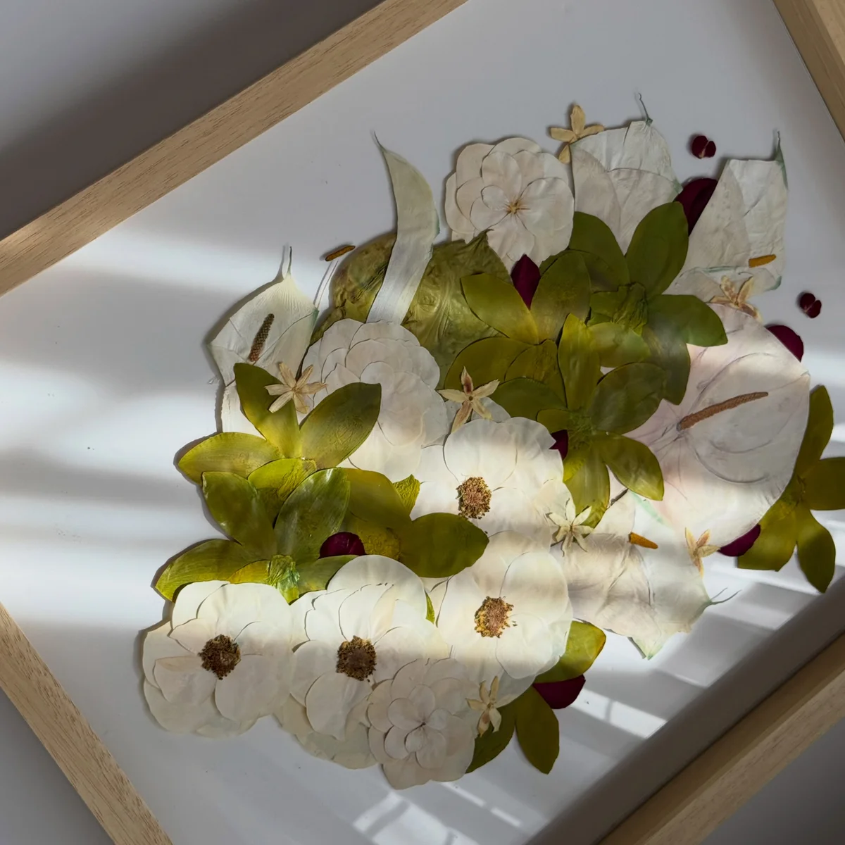 Roses, calla lilies & green orchids